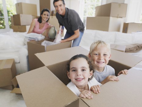 Kennington office move logistics with packing boxes and furniture handling