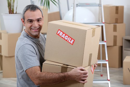 Local man and van moving items in Kennington street setting