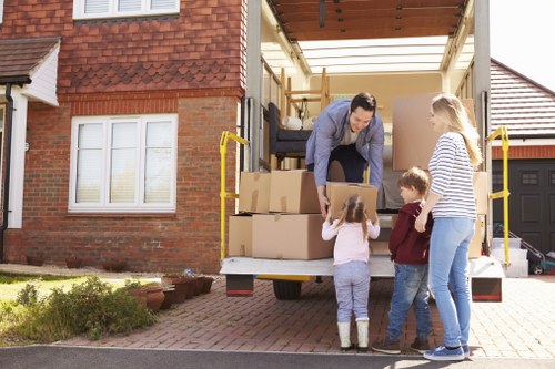 Removalists loading household furniture for a Kennington home move