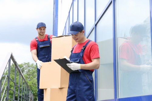 Worker assessing lifting and loading safety