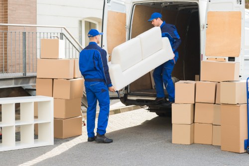 Packed boxes and furniture ready for a house move in Kennington