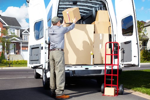 Careful wrapping of fragile household items during a Kennington move