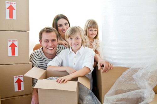 Local office removals team handling business equipment in Kennington