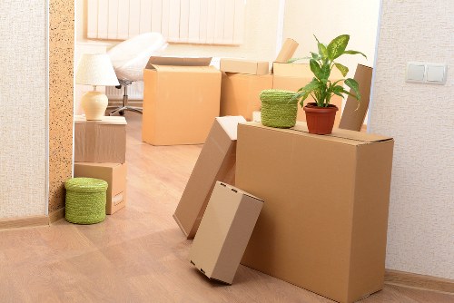 Packed student boxes and furniture prepared for local transport