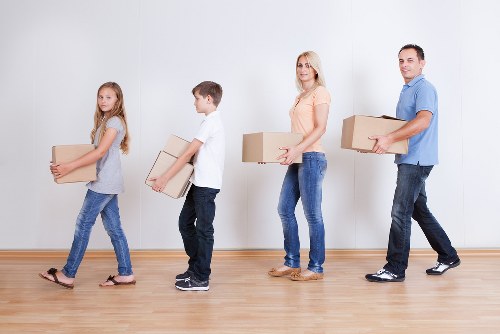 Packed household items arranged for a load-based quote